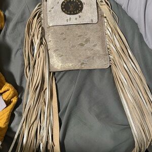 Cream Crossbody Bag with Fringe and Decorative Element